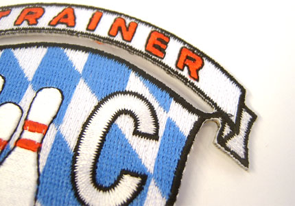 A stitched laser cut border.