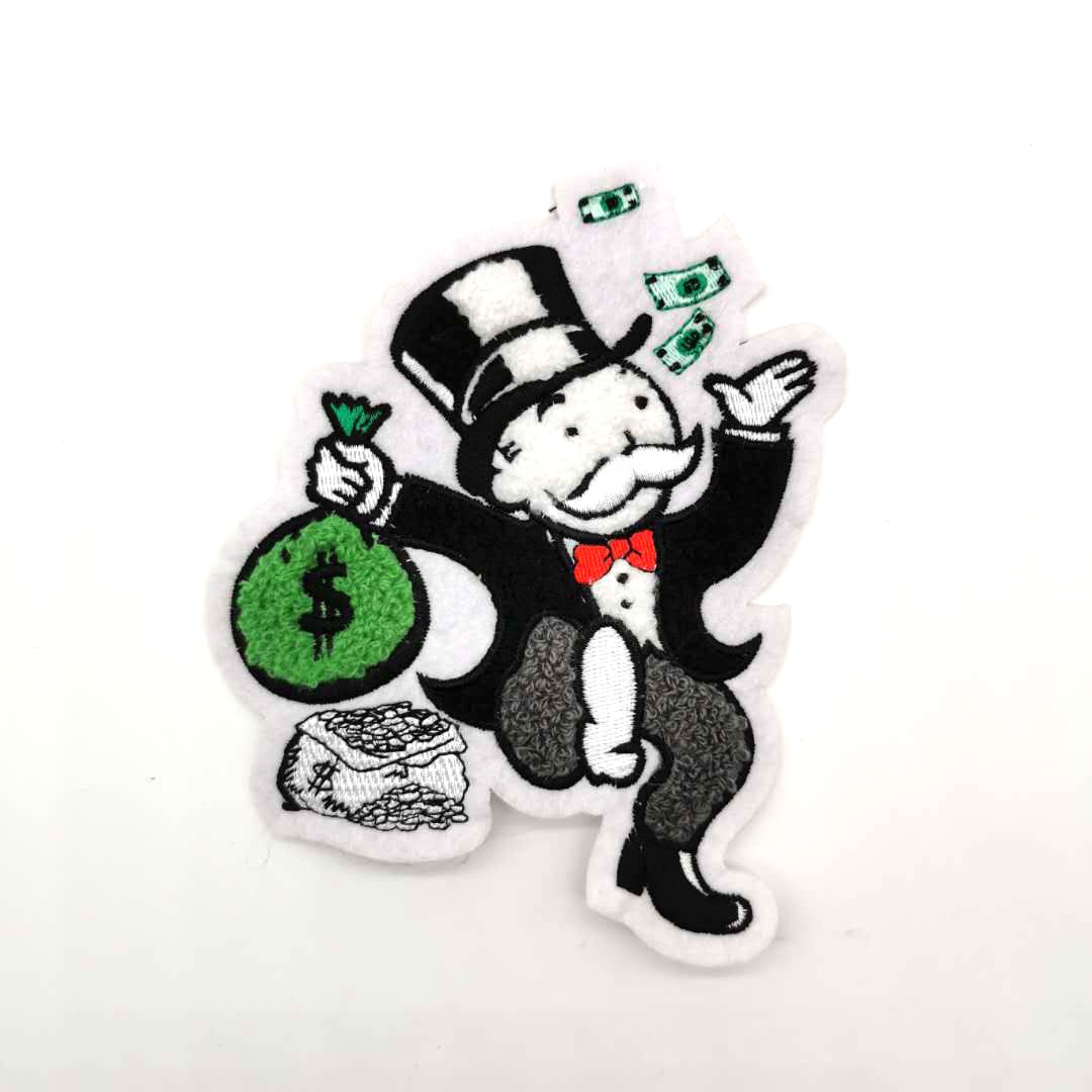 A custom made chenille mascot patch of monopoly game character carrying a bag of money