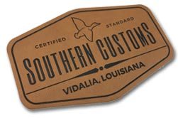 cut to shape faux leather custom made patch with inked debossing