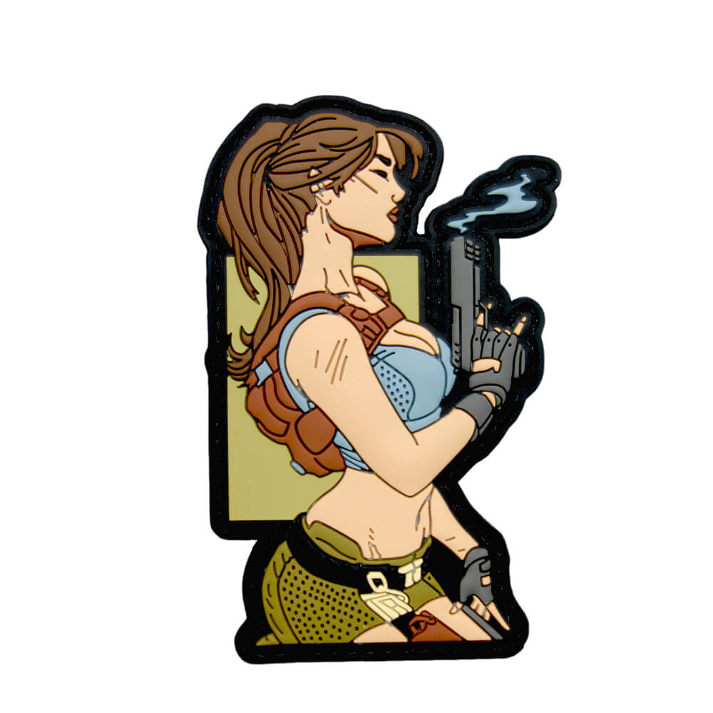 custom 3D pvc patch made with a woman standing and holding a gun