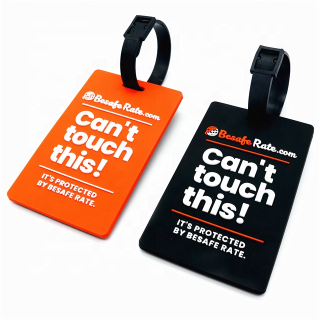 two pvc luggage tags orange and black color