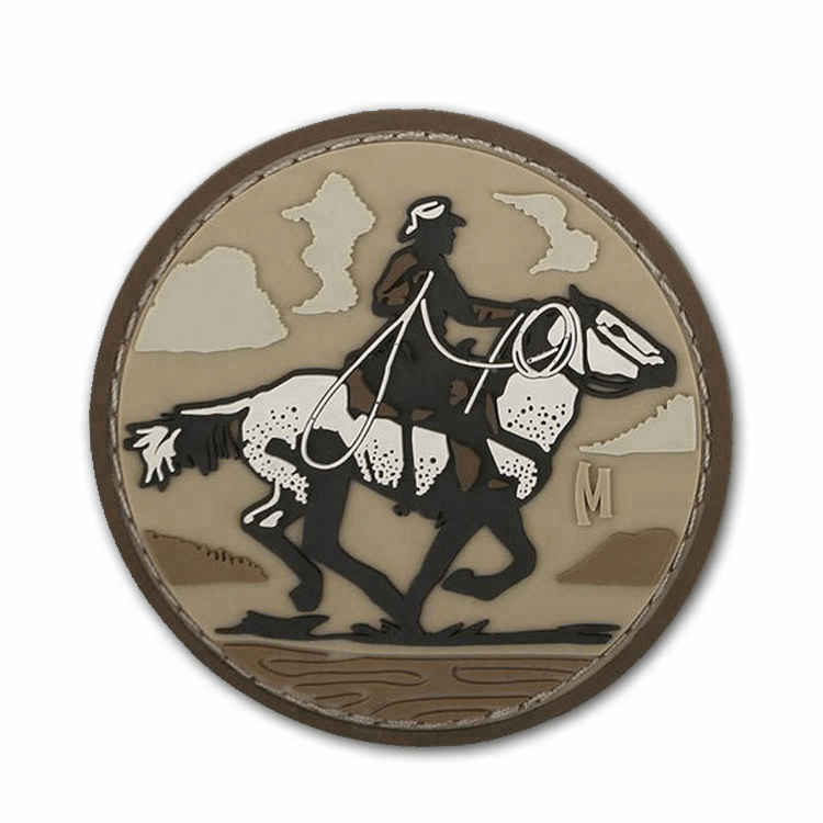 pvc patch with sew channel pvc patch of man riding a horse, with a sew chaneel around the border