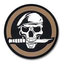 custom made pvc patch of a skull wearing a beret with knife in mouth